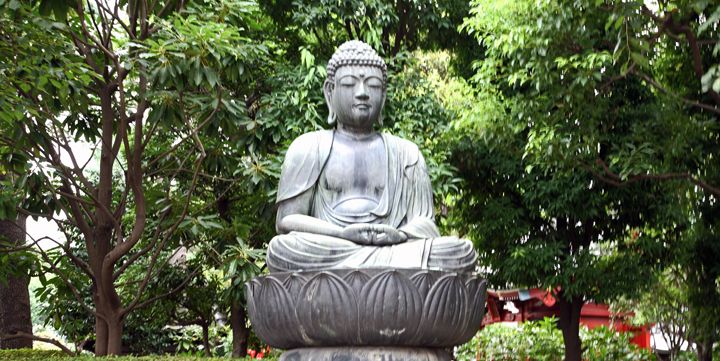 photo of statue of Buddha