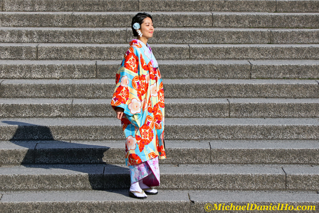 photo of woman in kimono on steps